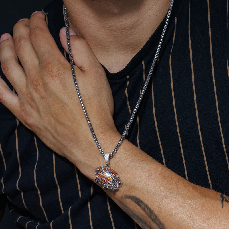 Rhodium Plated 925 Sterling Silver Claw Football Clear and Orange CZ Pendant
