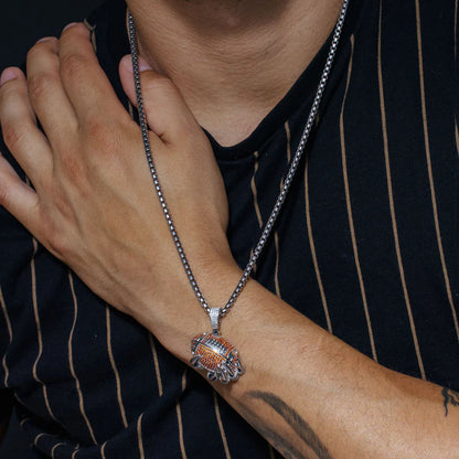 Rhodium Plated 925 Sterling Silver Claw Football Clear and Orange CZ Pendant